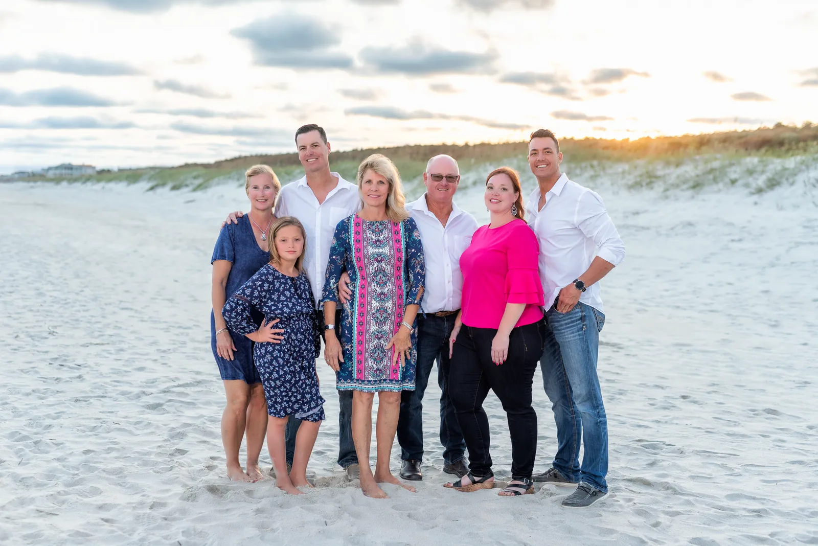 Family standing together in a great sunset - Huntington Beach State Park