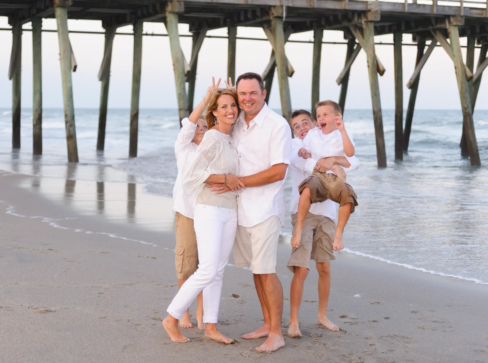 Parents getting photobombed in romantic picture - Myrtle Beach State Park