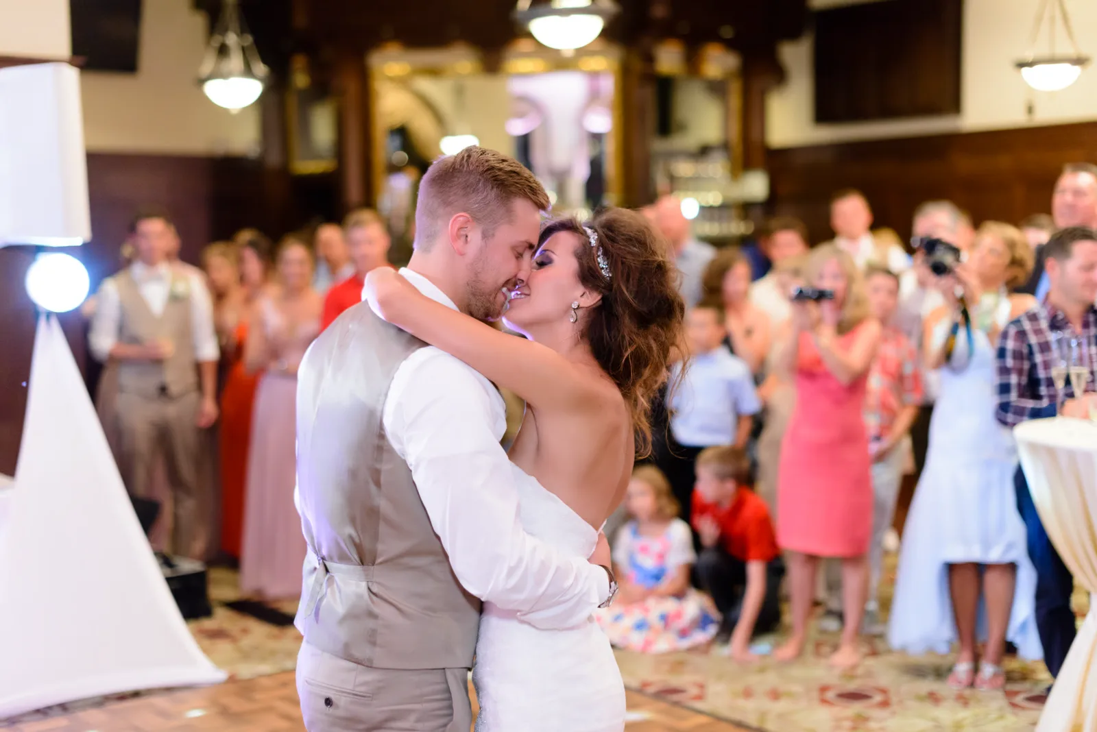Bride and groom having kiss during first dance - Grande Dunes Ocean Club