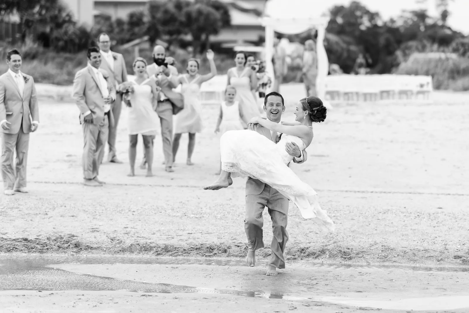 Carrying his bride over the water - Hilton at Kingston Plantation