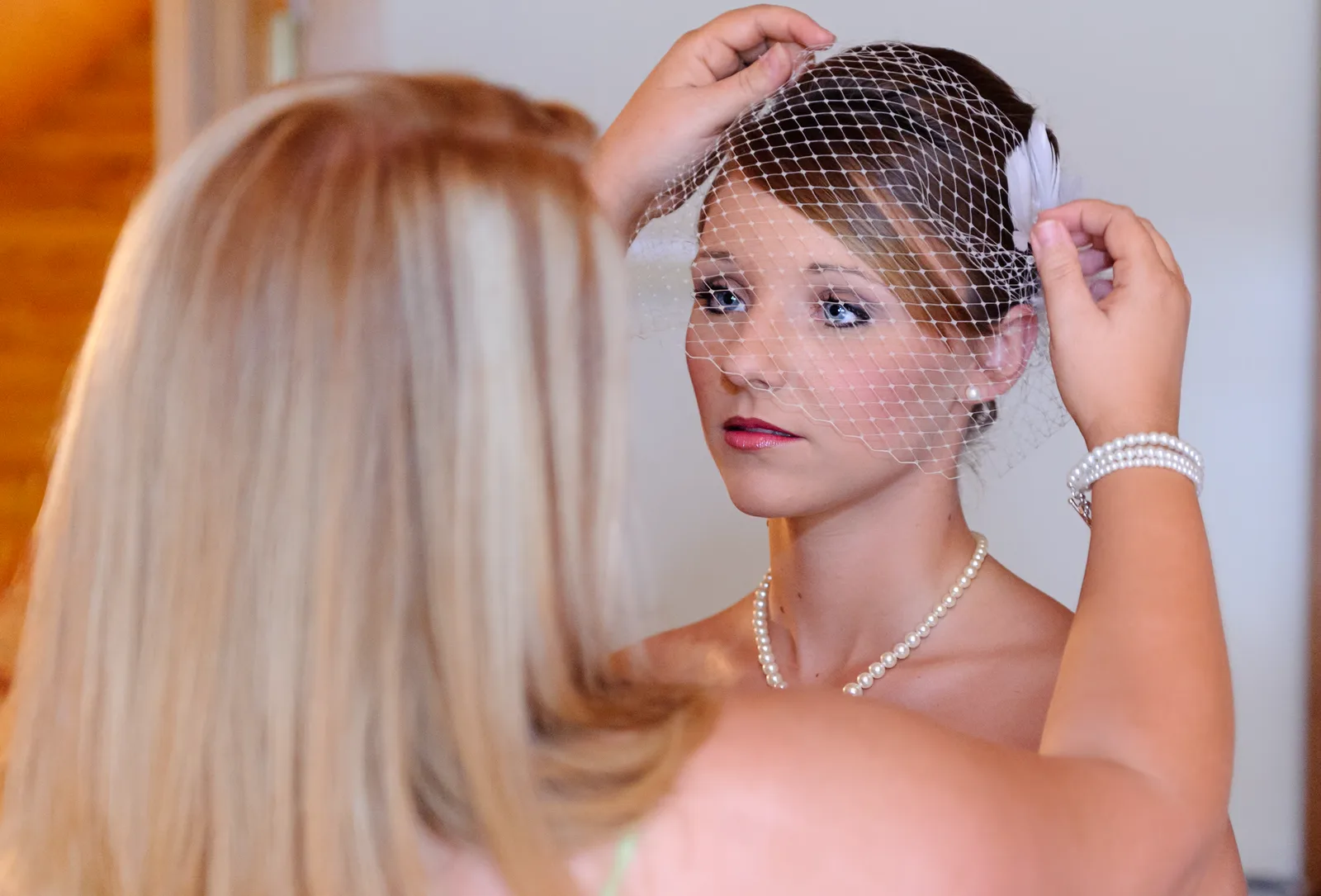 Mother helping bride to put on her veil - Conway, SC