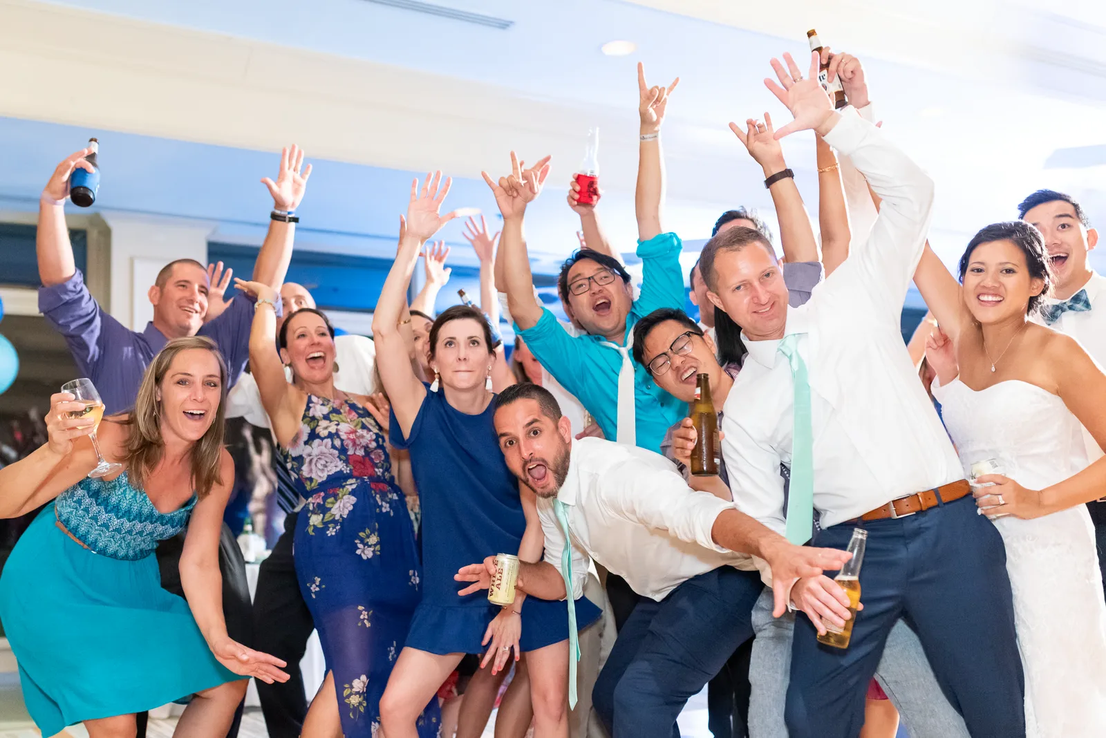 Fun dancing during the wedding reception - Dunes Golf and Beach Club