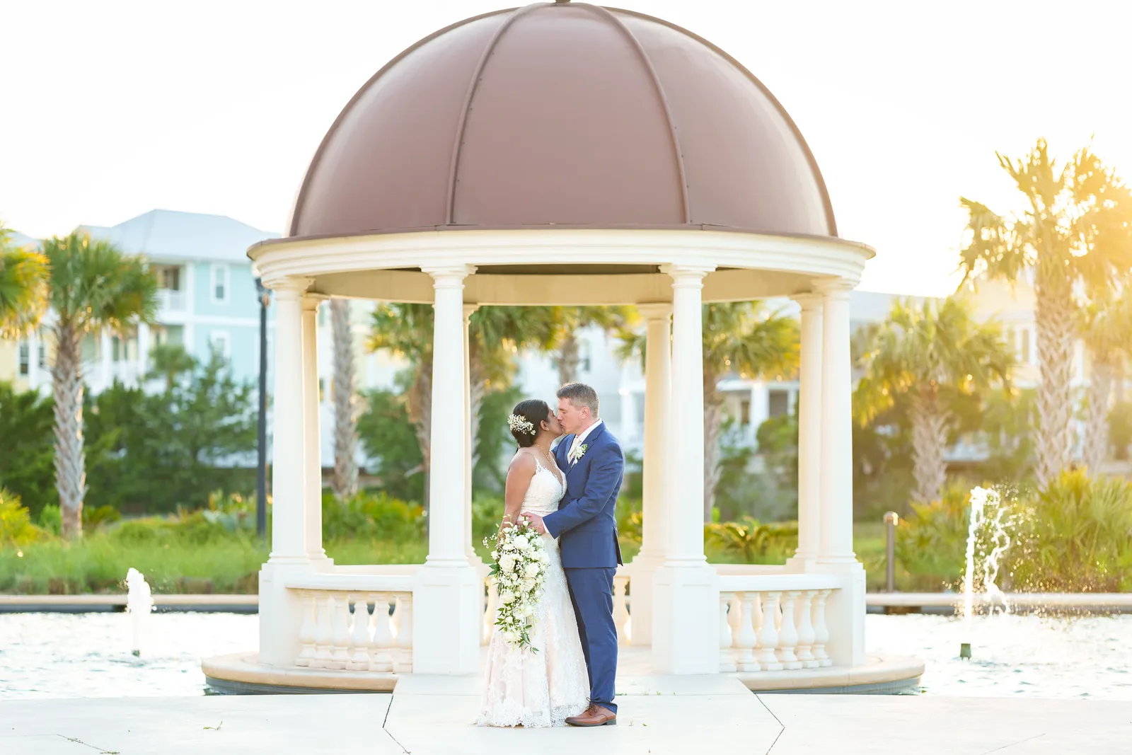 Bride and groom under the gazebo at sunset - 21 Main Events