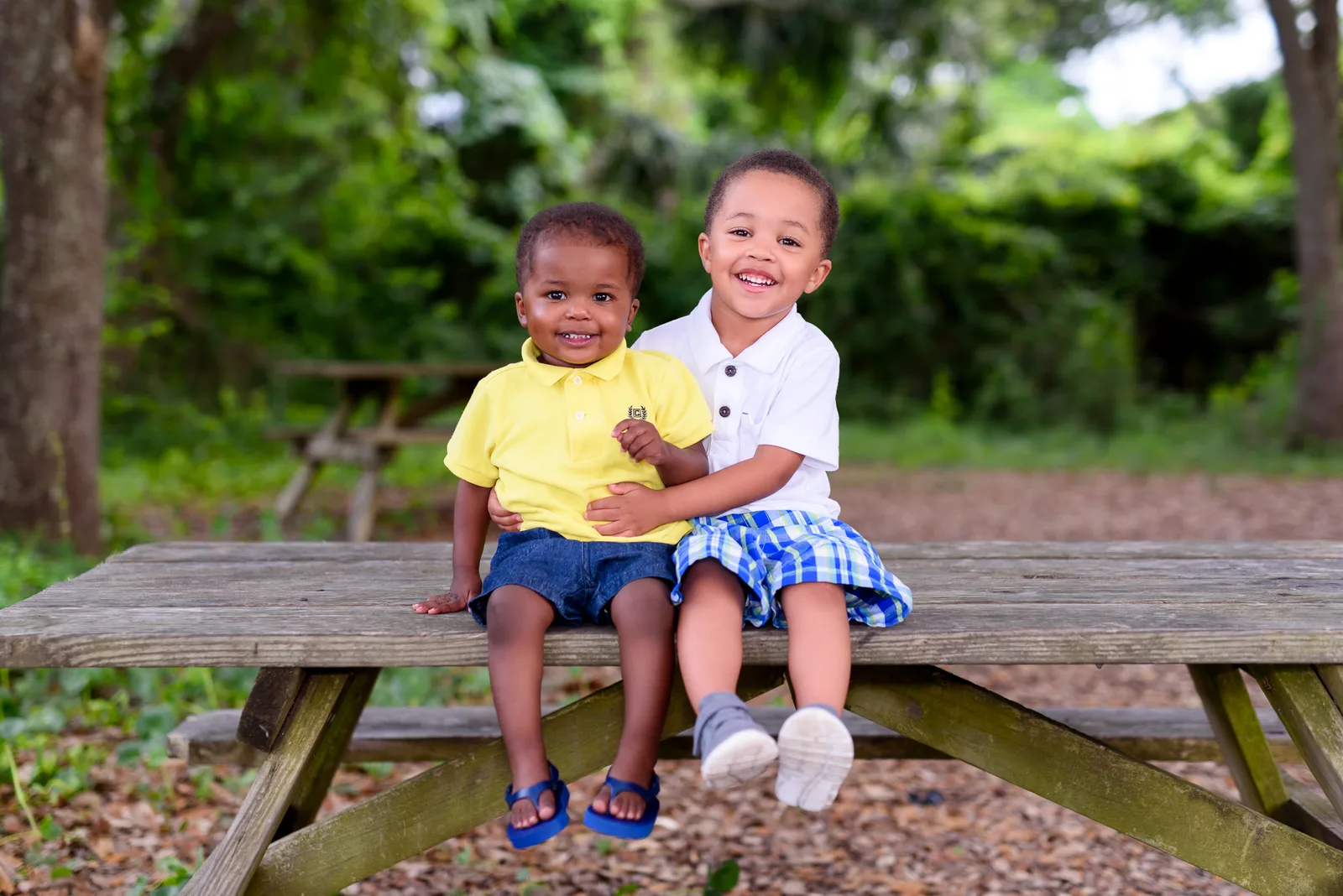 Boys sitting on a picnic table in the park - Myrtle Beach State Park
