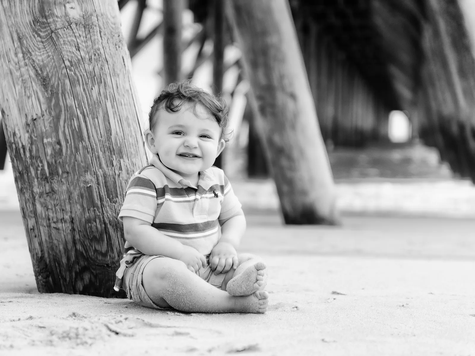 Cute little guy under the pier in black and white - Myrtle Beach State Park