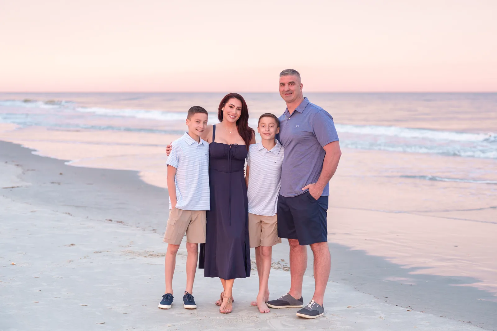 Family of 4 after sunset on the beach - Huntington Beach State Park