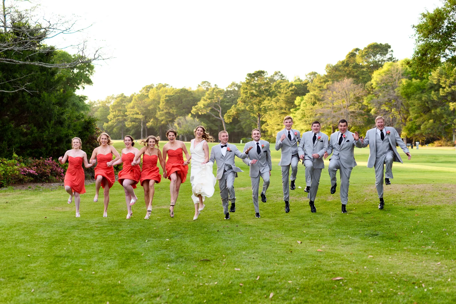 Wedding party skipping down the golf course - Litchfield Country Club
