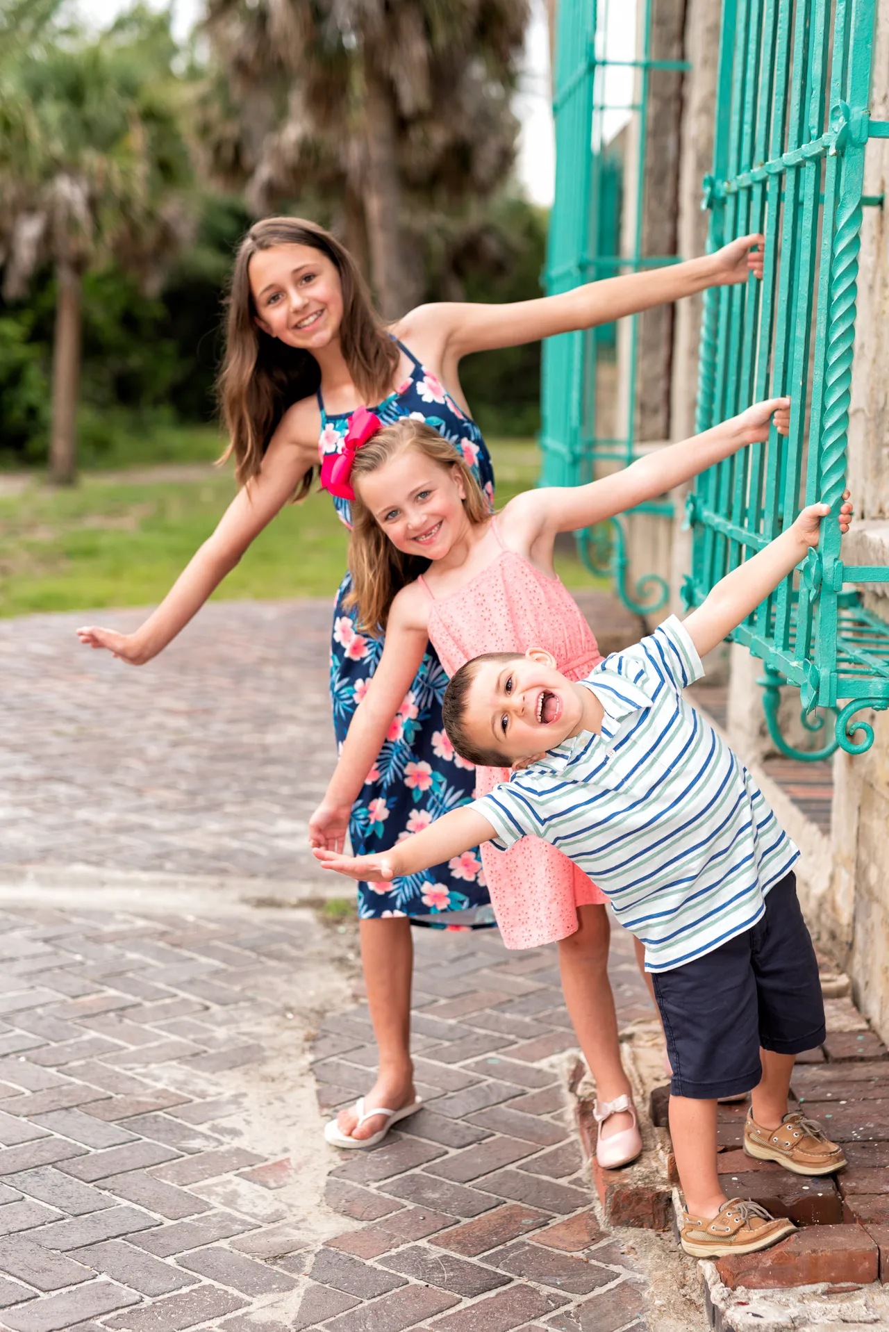 Kids having fun by the castle window - Huntington Beach State Park
