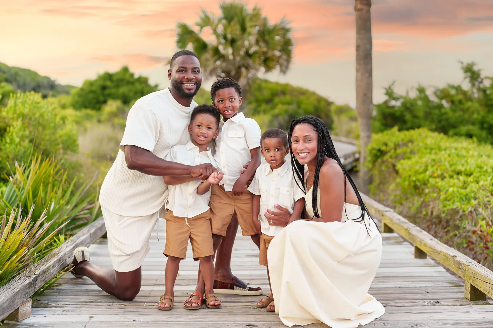 Happy family of 5 on the boardwalk - Myrtle Beach State Park