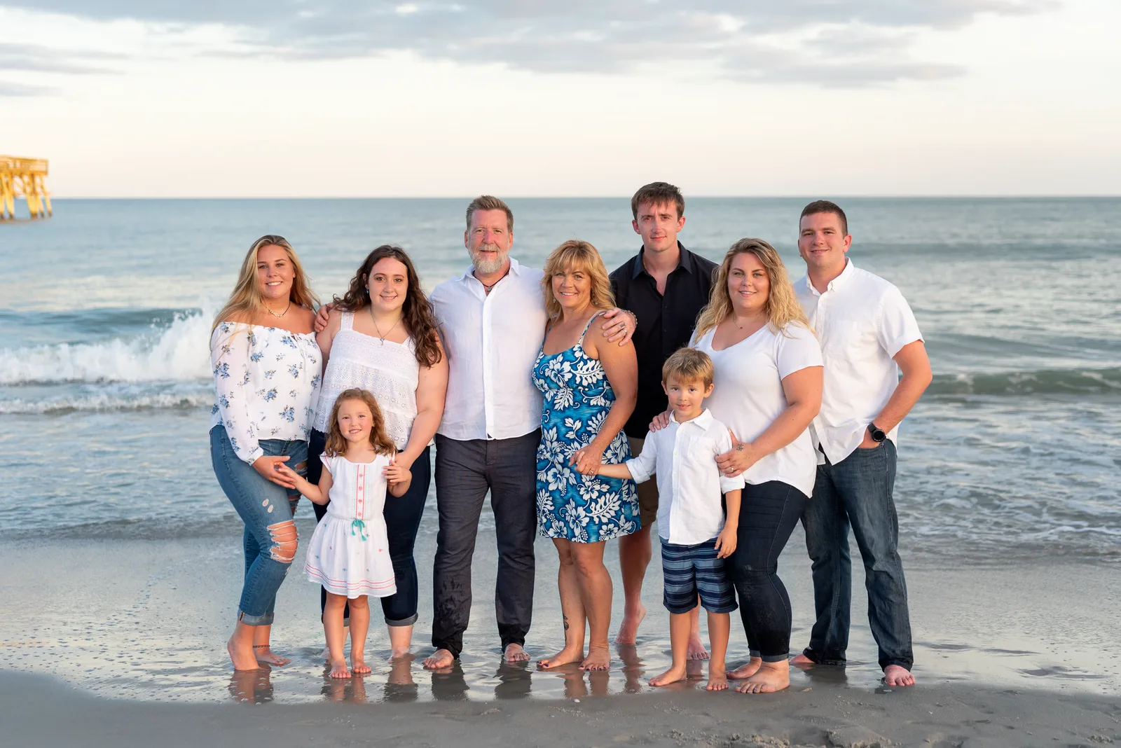 Mom and dad with 6 kids in front of the ocean - Myrtle Beach State Park