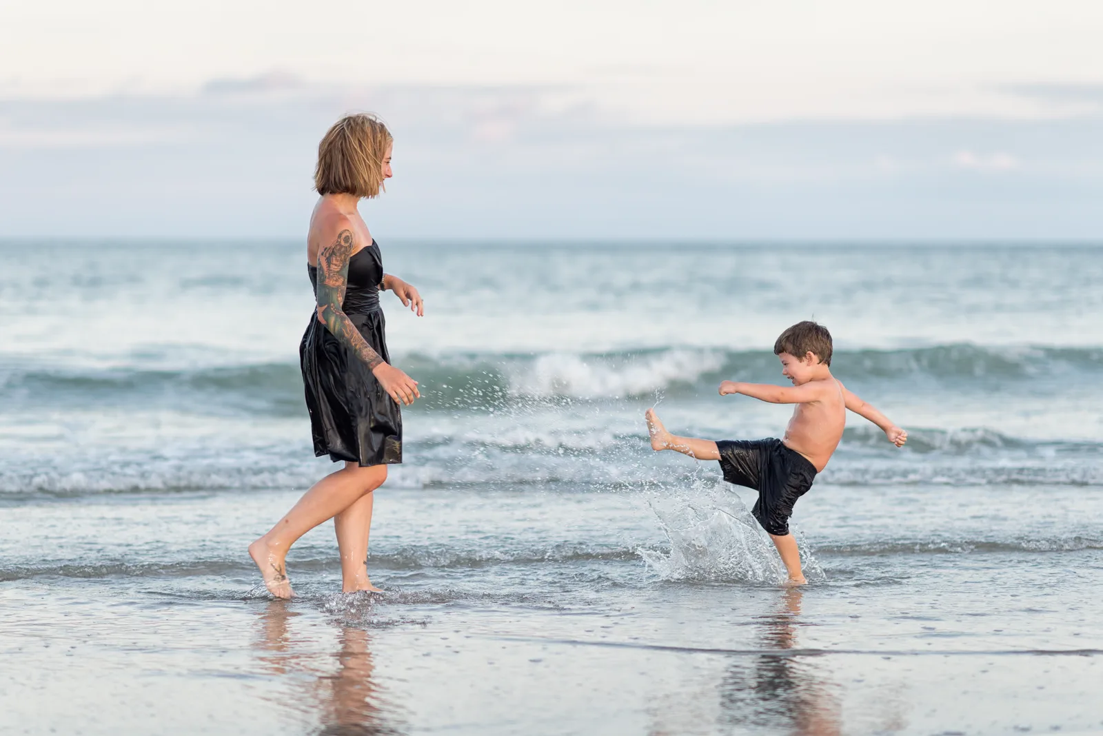 Mom and son playing in the ocean - Myrtle Beach