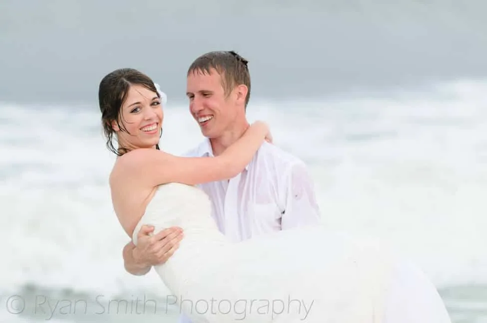 Bride standing in front of the sunset - Ocean Isle