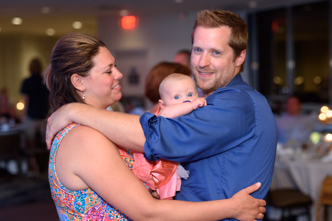 Cute baby dancing with mom and dad - Hilton Myrtle Beach Resort at Kingston Resorts