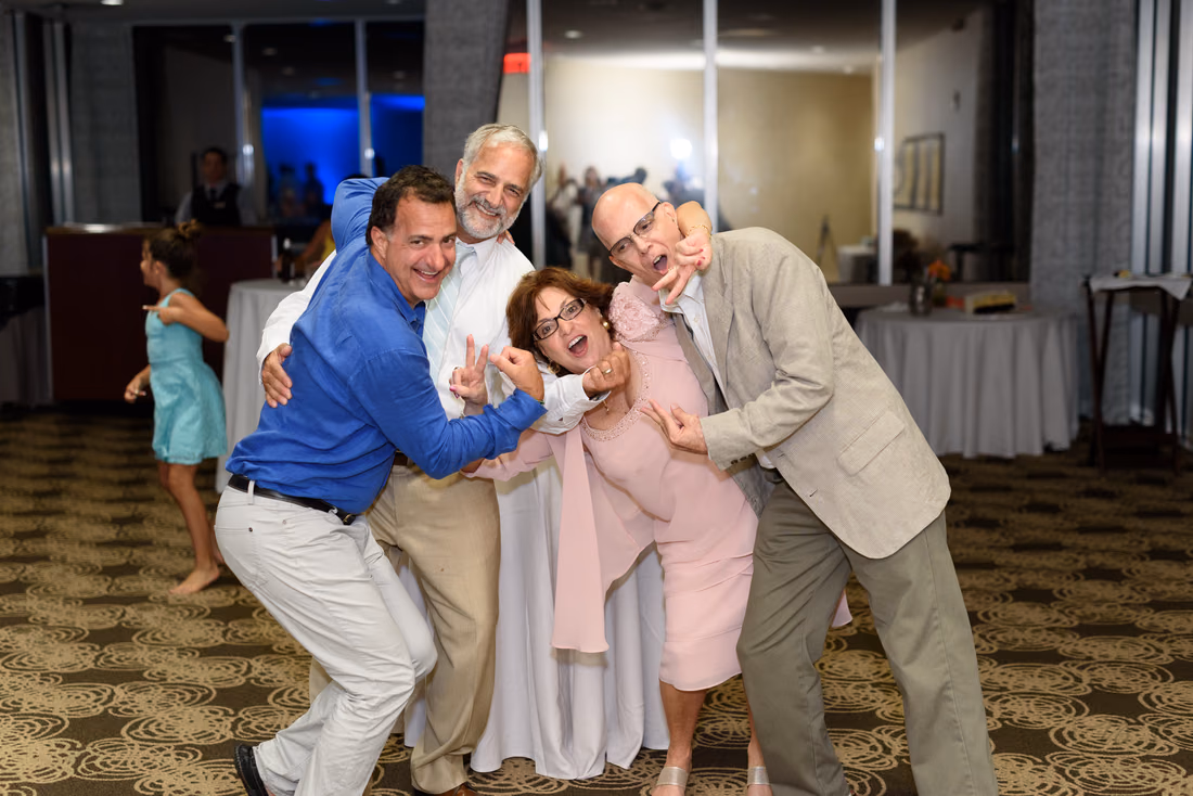Family having fun during reception - Hilton Myrtle Beach Resort at Kingston Resorts