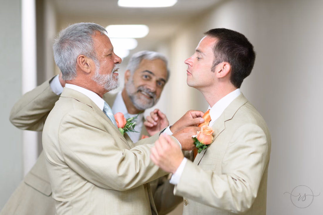 Groom and dad getting photobombed by father in law - Hilton Myrtle Beach Resort at Kingston Resorts