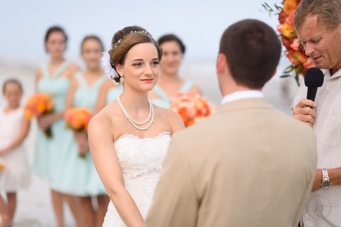 Groom giving vows to bride - Hilton Myrtle Beach Resort at Kingston Resorts