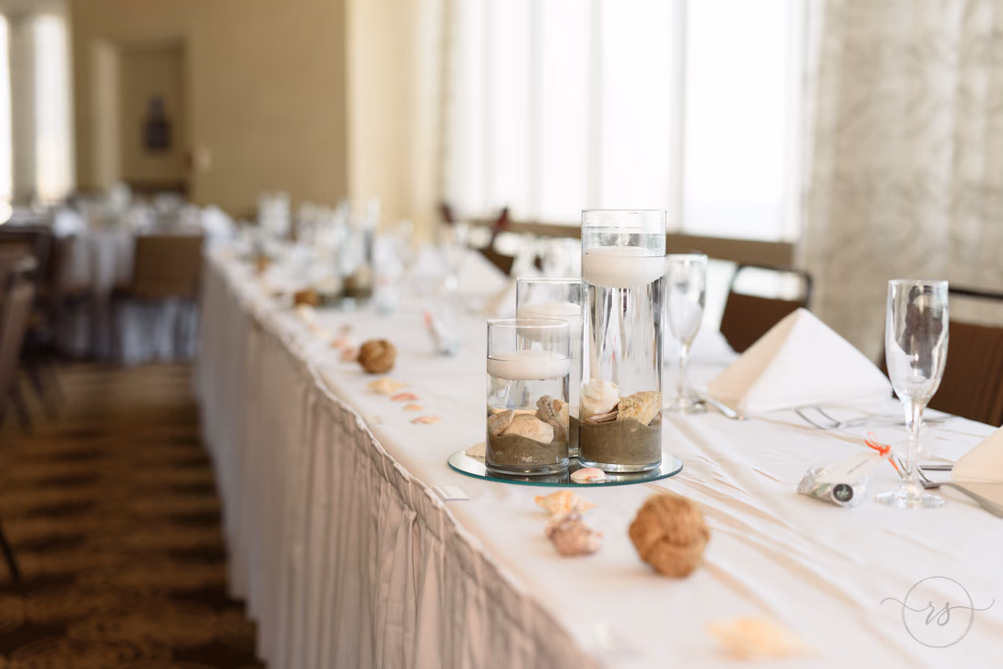 Seashell and sand table decorations - Hilton Myrtle Beach Resort at Kingston Resorts