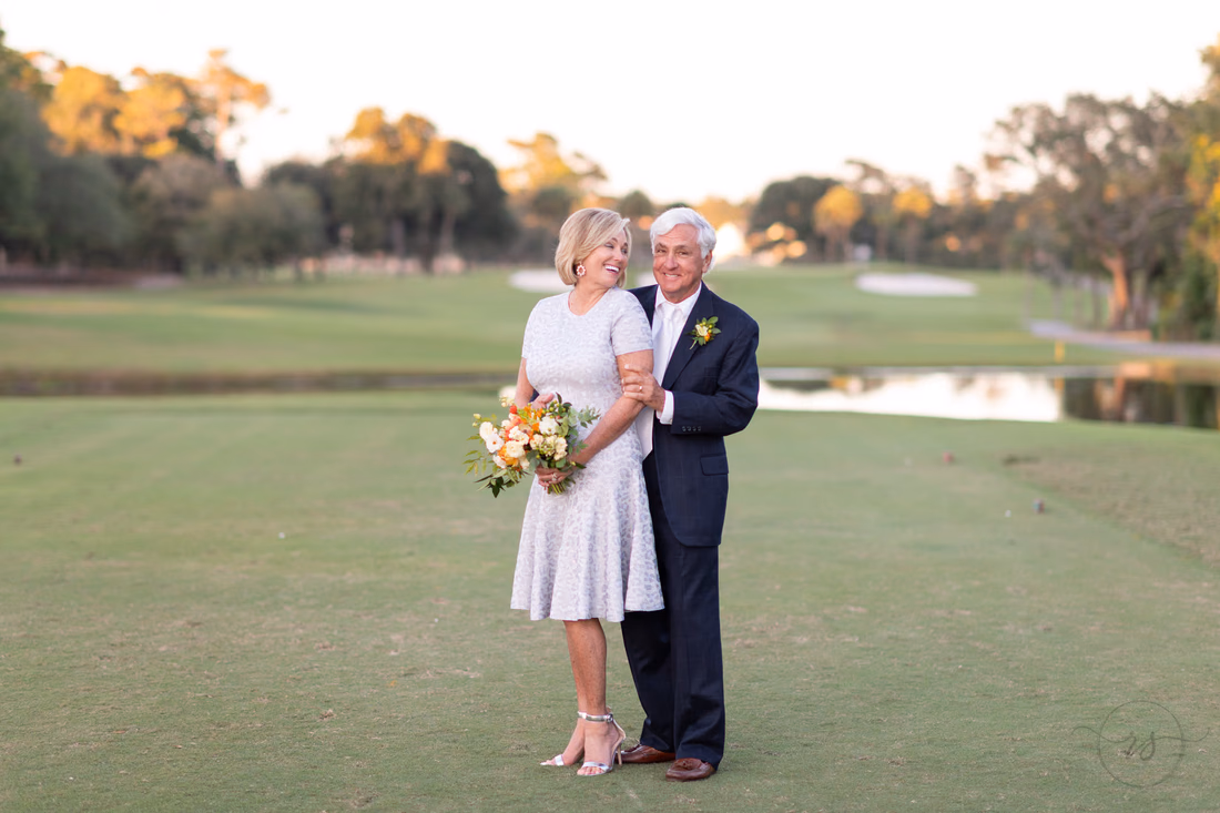 Bride smiling back at the groom - Dunes Golf and Beach Club - Myrtle Beach