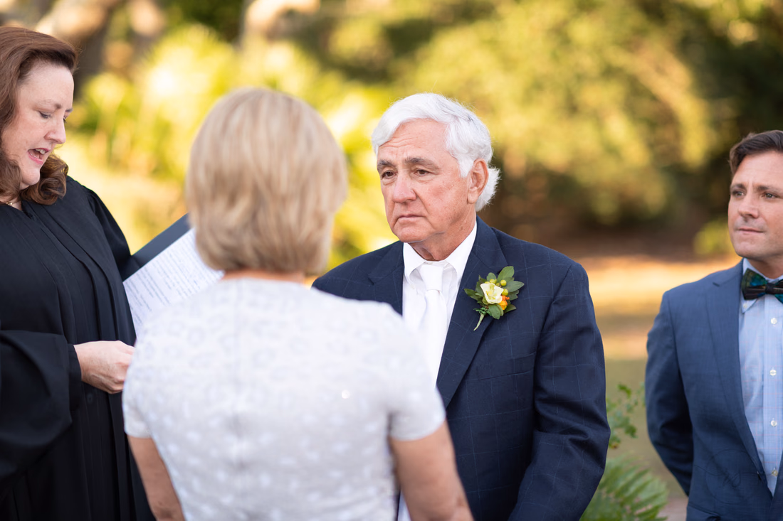 Groom looking at bride during the vows - Dunes Golf and Beach Club - Myrtle Beach