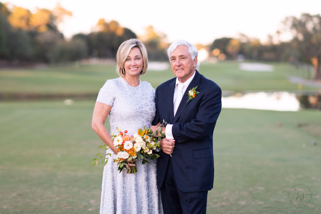 Holding hands with golf course in the background - Dunes Golf and Beach Club - Myrtle Beach