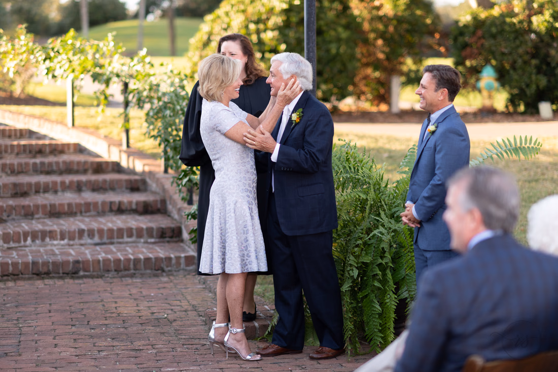 Pulling groom in for first kiss - Dunes Golf and Beach Club - Myrtle Beach