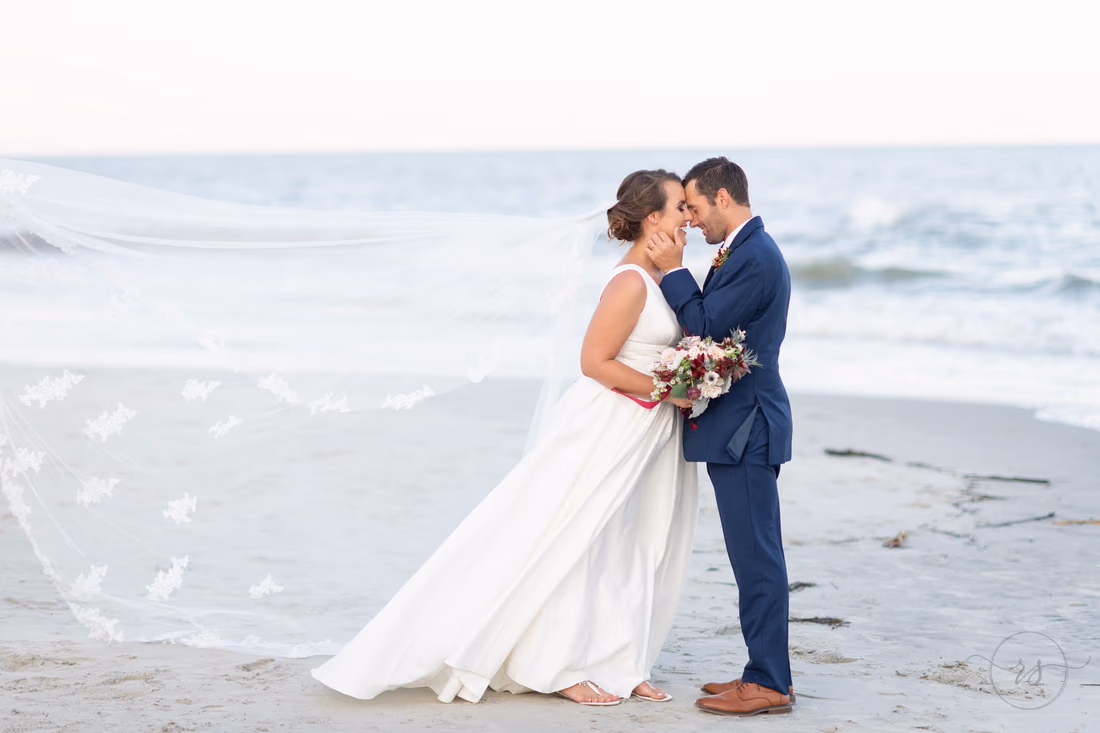 Groom touching bride's face - Pelican Inn - Pawleys Island