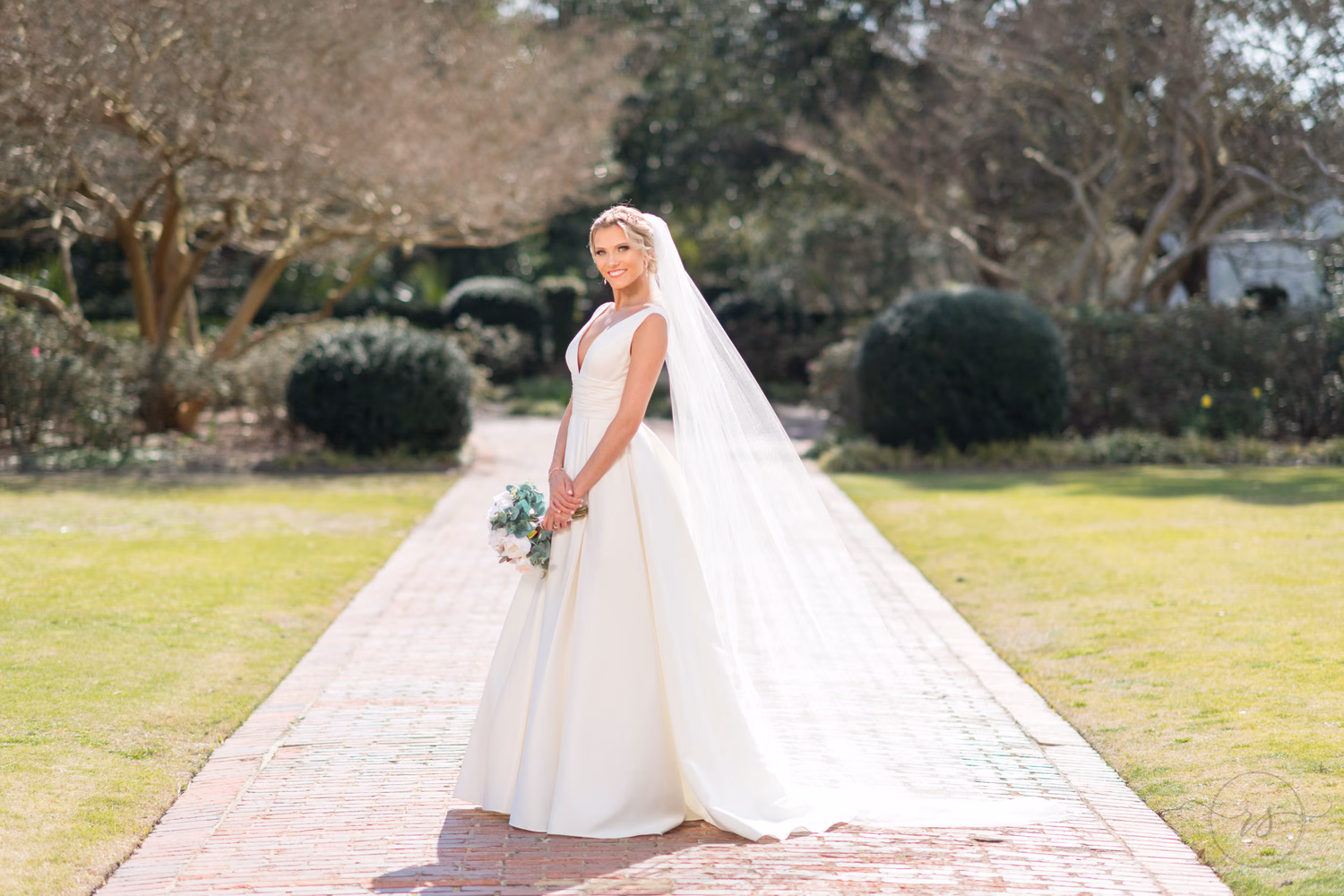 Bride backlit by the sun coming through her veil using fill flash - Pine Lakes Country Club