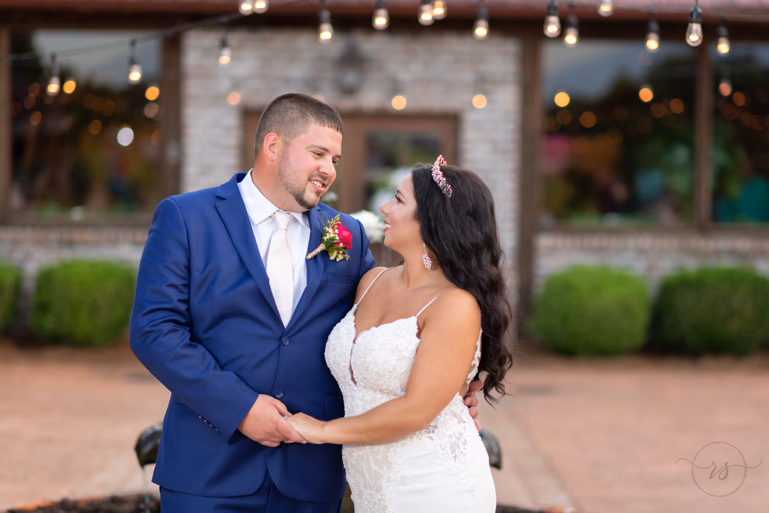 Bride and groom looking into each others eyes - Hidden Acres
