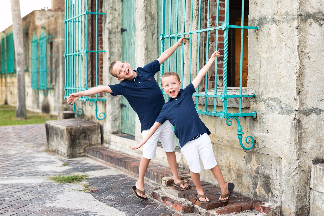 Boys striking a pose at Atalaya Castle at Huntington Beach State Park