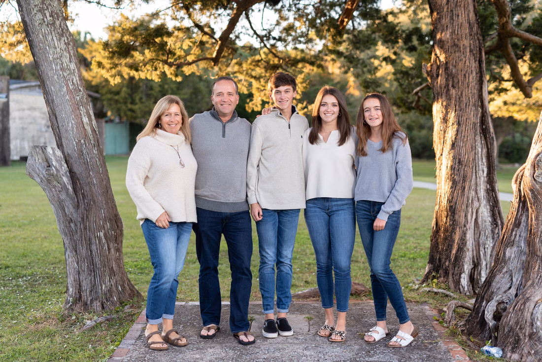 Happy family of 5 with adult kids - Huntington Beach State Park