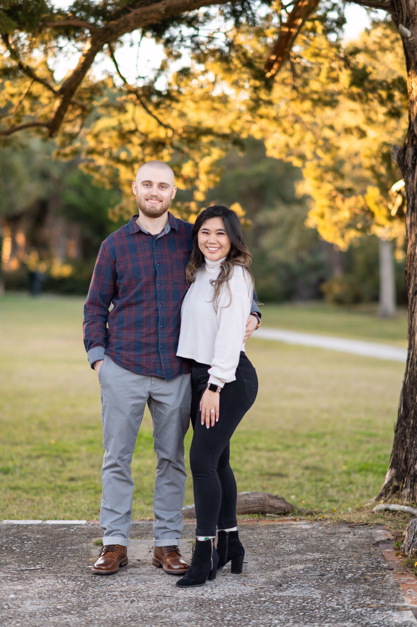 Engagement portraits under the old oaks near the castle wall - Huntington Beach State Park
