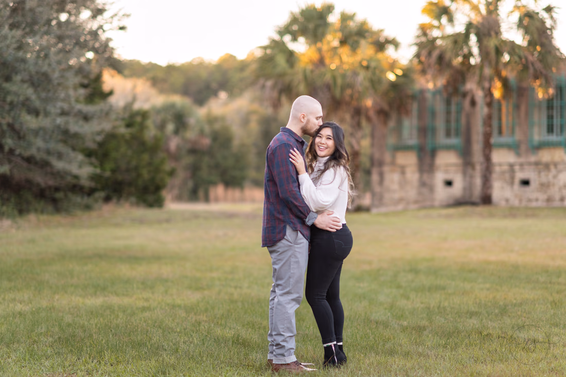 Kissing on the head behind the castle - Huntington Beach State Park