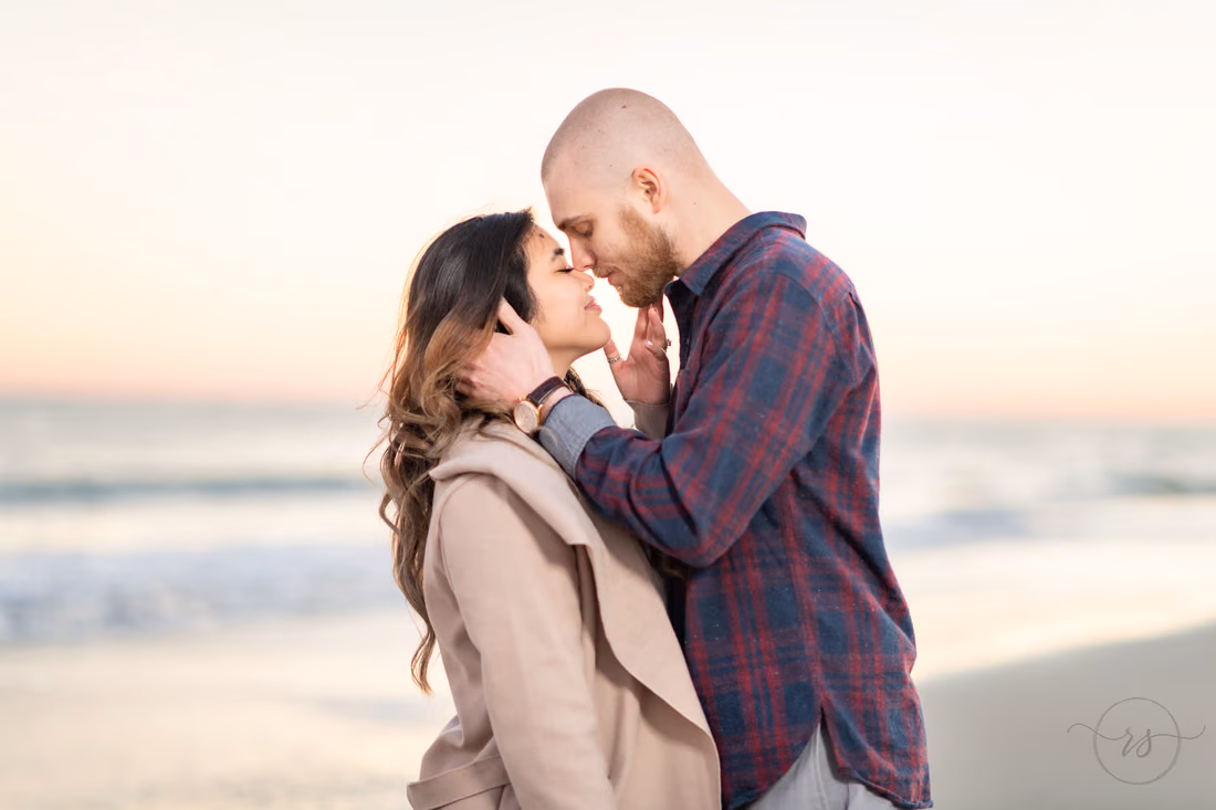 Touching each other's faces in the sunset - Huntington Beach State Park