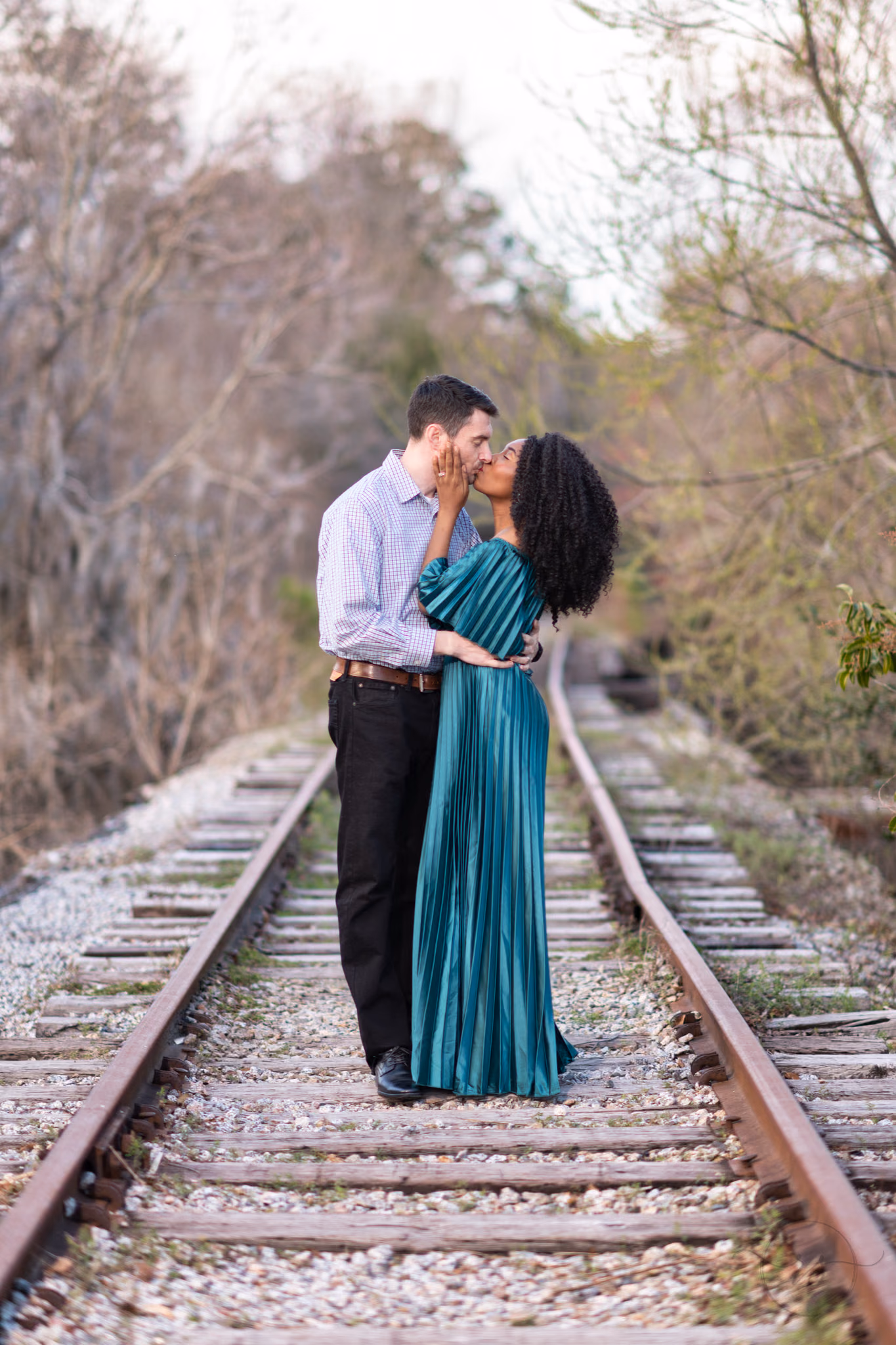 Kiss on the old train tracks - Conway Riverwalk