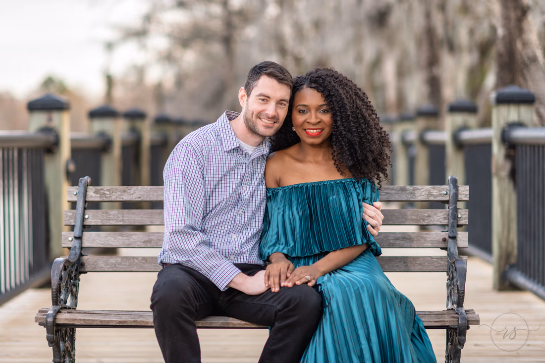 Portrait embracing on the bench - Conway Riverwalk