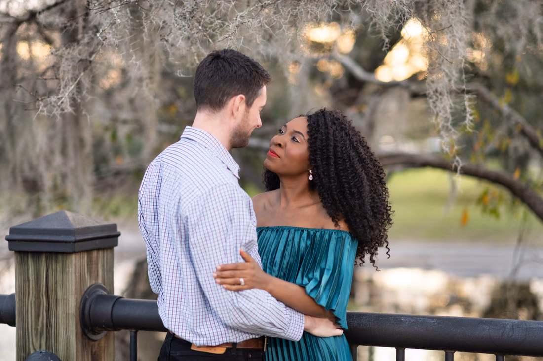 Wife looking into the eyes of her husband - Conway Riverwalk
