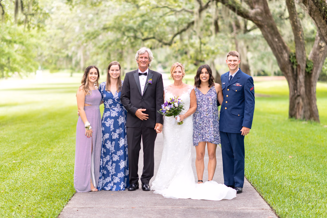 Bride and groom with children after the ceremony - Holiday Cottage - Brookgreen Gardens