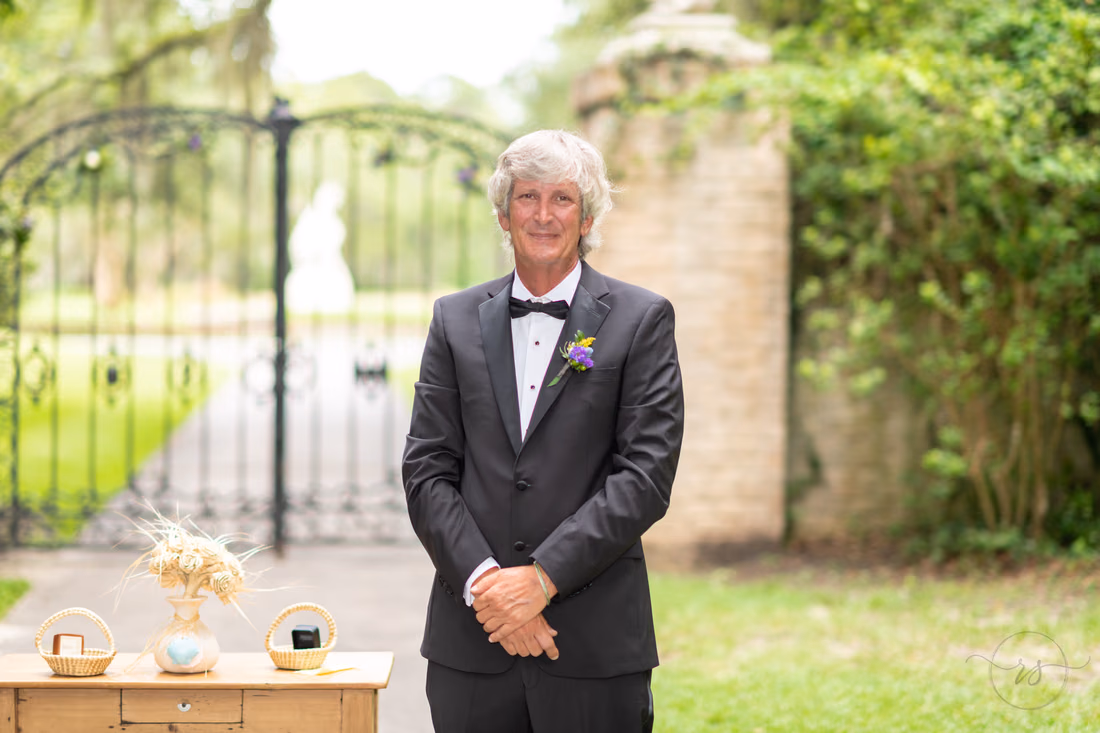 Groom watching bride walk towards him - Holiday Cottage - Brookgreen Gardens