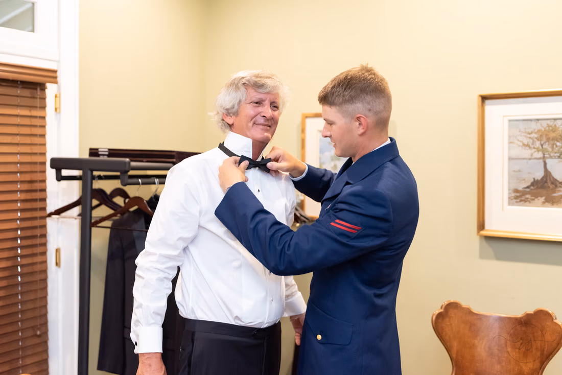 Groom's son helping with his bowtie - Holiday Cottage - Brookgreen Gardens