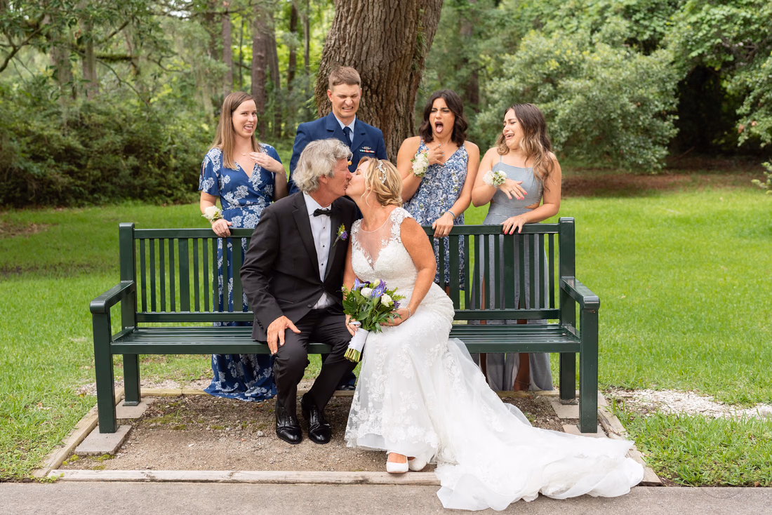 Kids making faces from mom and dad kissing - Holiday Cottage - Brookgreen Gardens