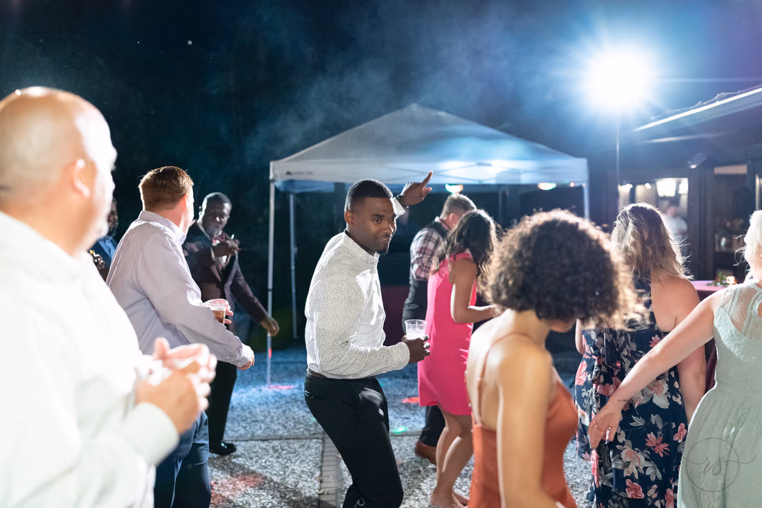 Fun dancing at outdoor reception - Magnolia Plantation - Charleston, SC
