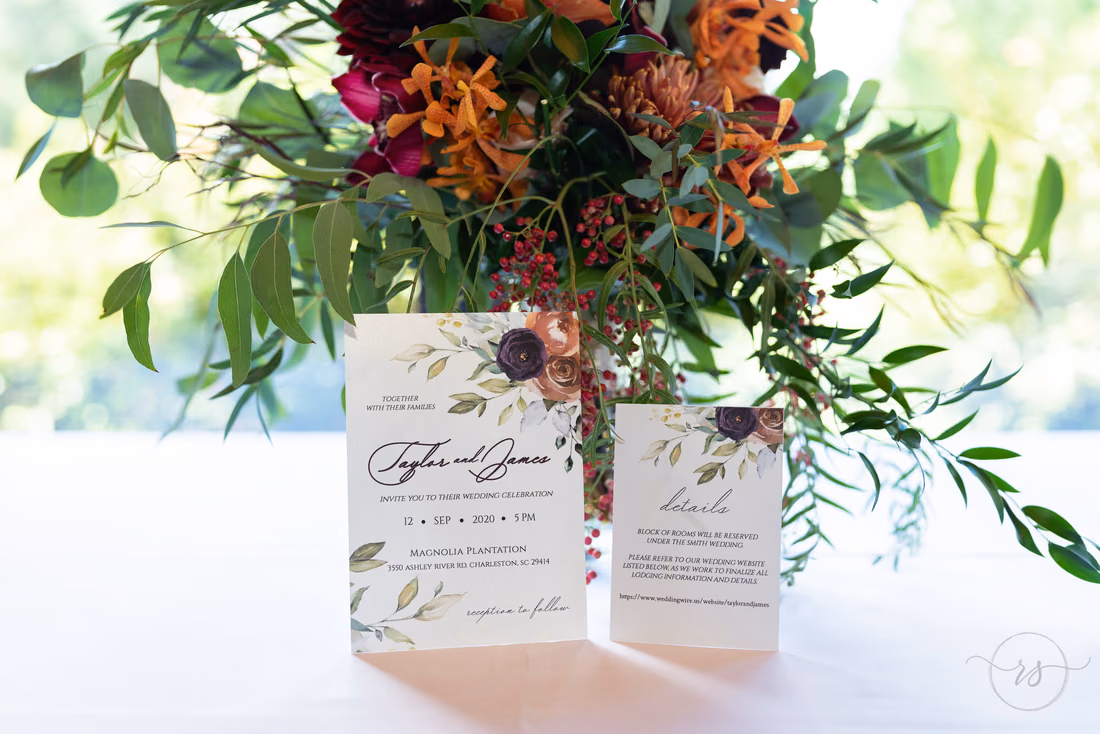 Wedding invitations leaning against the bouquet - Magnolia Plantation - Charleston, SC