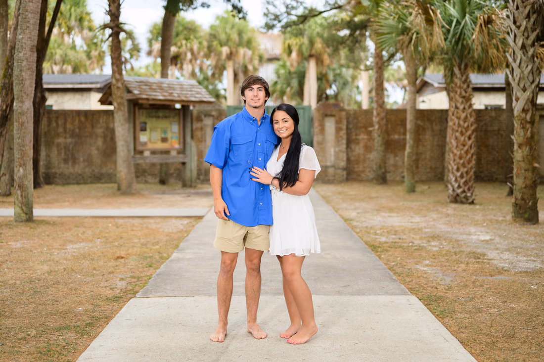 Young boyfriend and girlfriend in front of the castle - Huntington Beach State Park