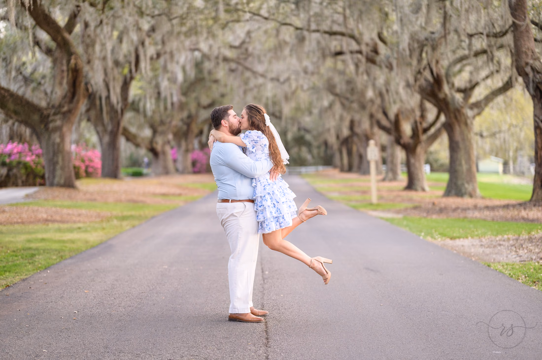 Lifting her in the air under the moss covered oaks - Caledonia Golf and Fish Club