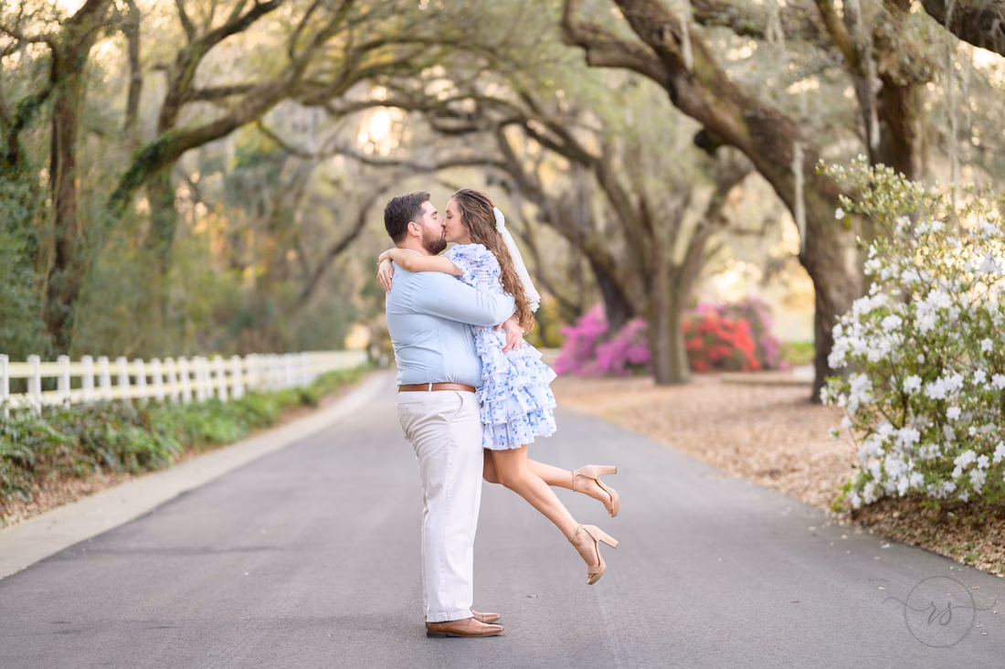 Lifting his girl in the air for a kiss - Caledonia Golf and Fish Club