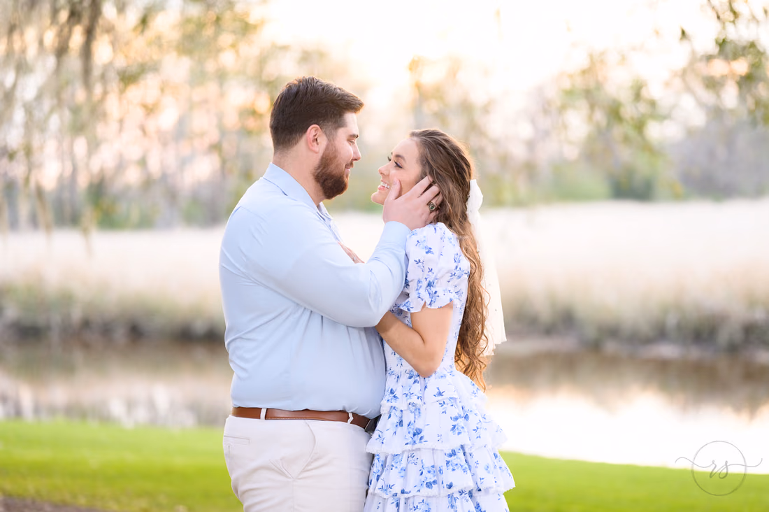 Pulling his fiancé in for a kiss - Caledonia Golf and Fish Club