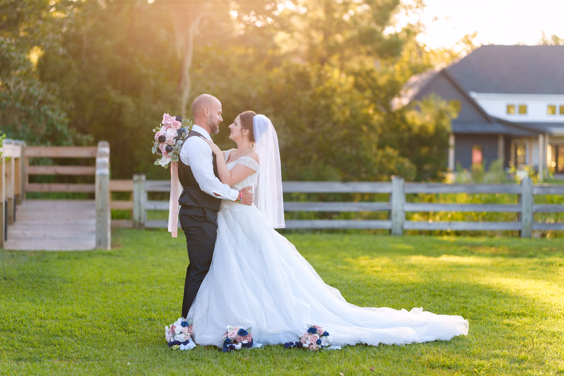 Bride and groom looking into each other's eyes - The Pavilion at Pepper Plantation