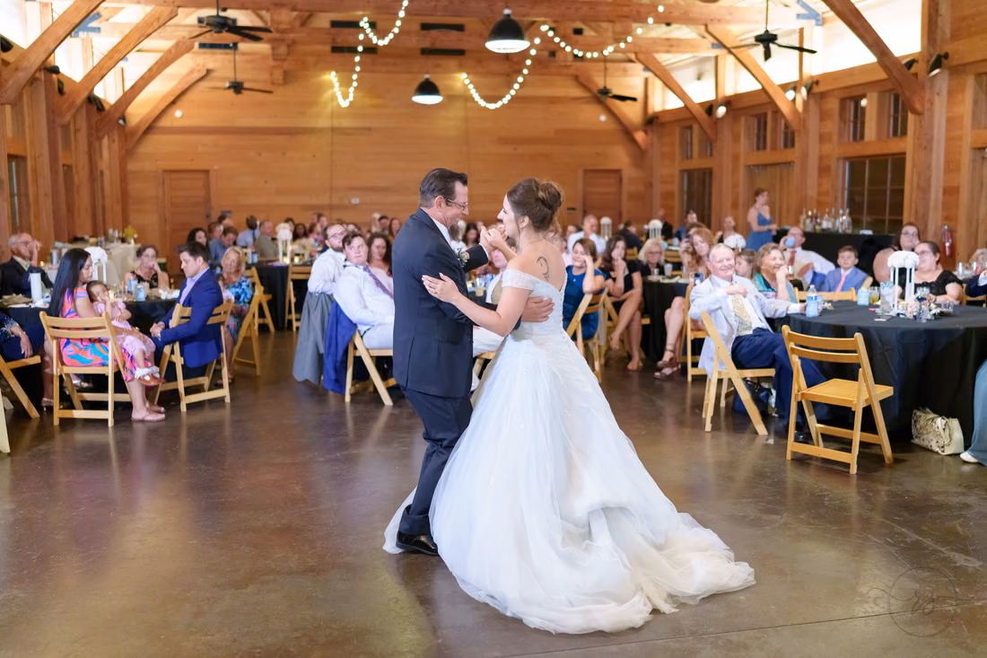 Bride and her father dancing in the middle of the reception hall - The Pavilion at Pepper Plantation