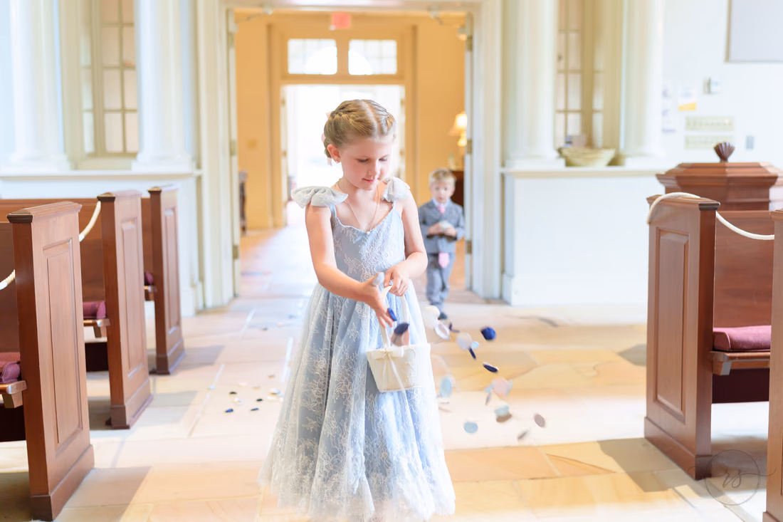 Flower girl tossing petals down the aisle as the ring bearer follows - Christ Episcopal Church