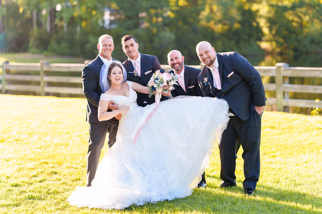 Groomsmen picking up the bride - The Pavilion at Pepper Plantation